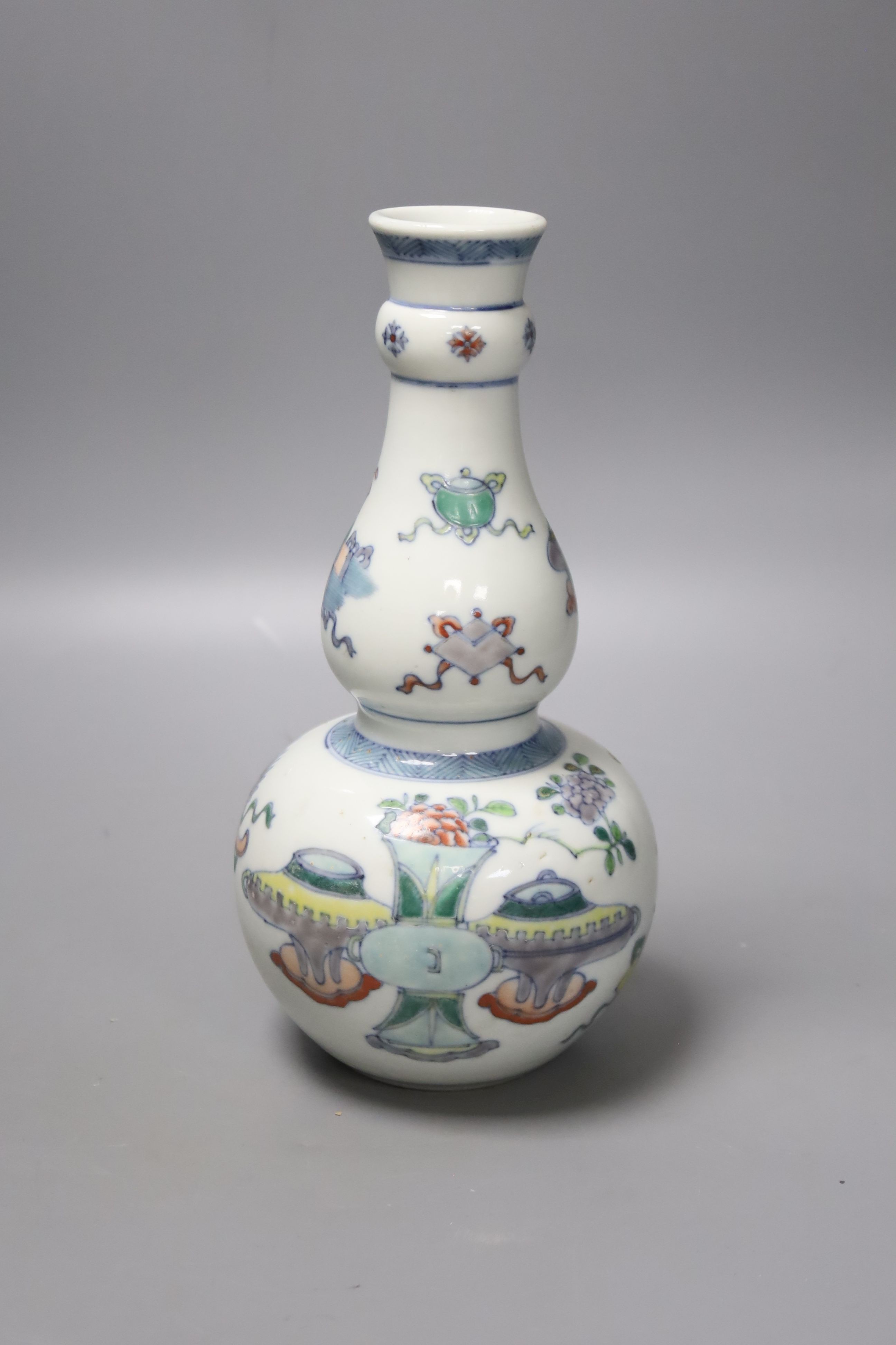 A Chinese famille verte 'Hundred Antiques' pattern doucai double gourd vase, height 24cm